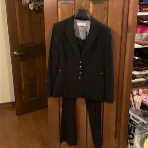 Tamarind pinstripe two piece suit.Never worn.